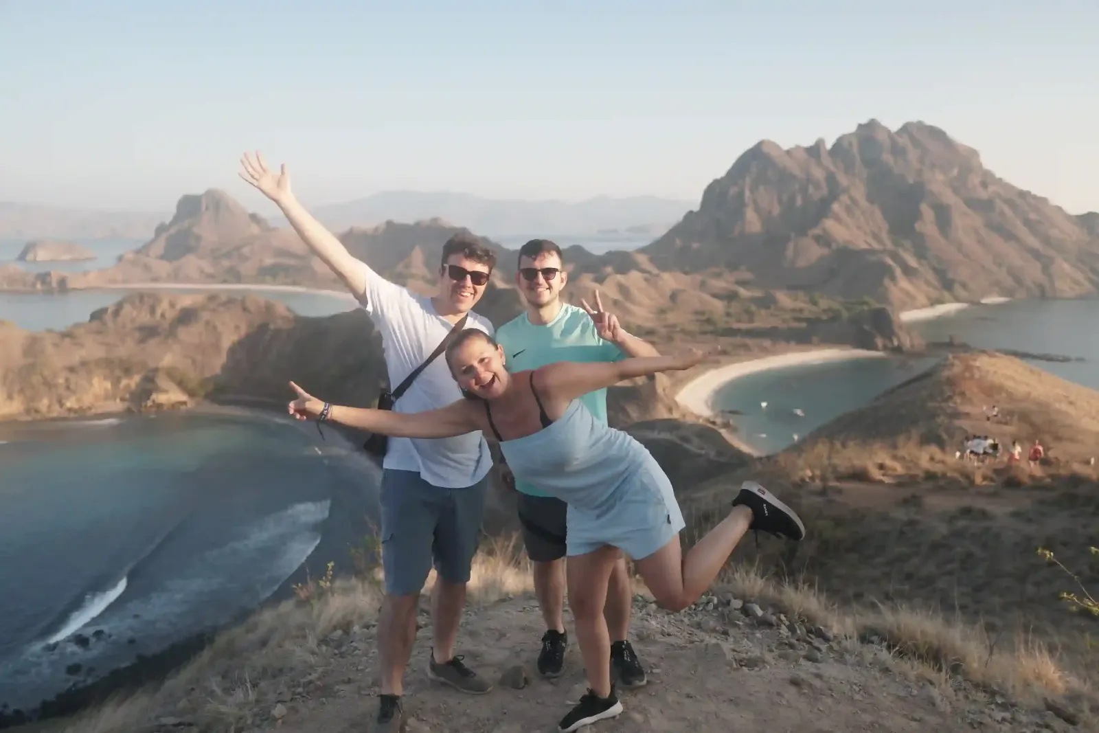 Two guests celebrating on the Padar Island ridge