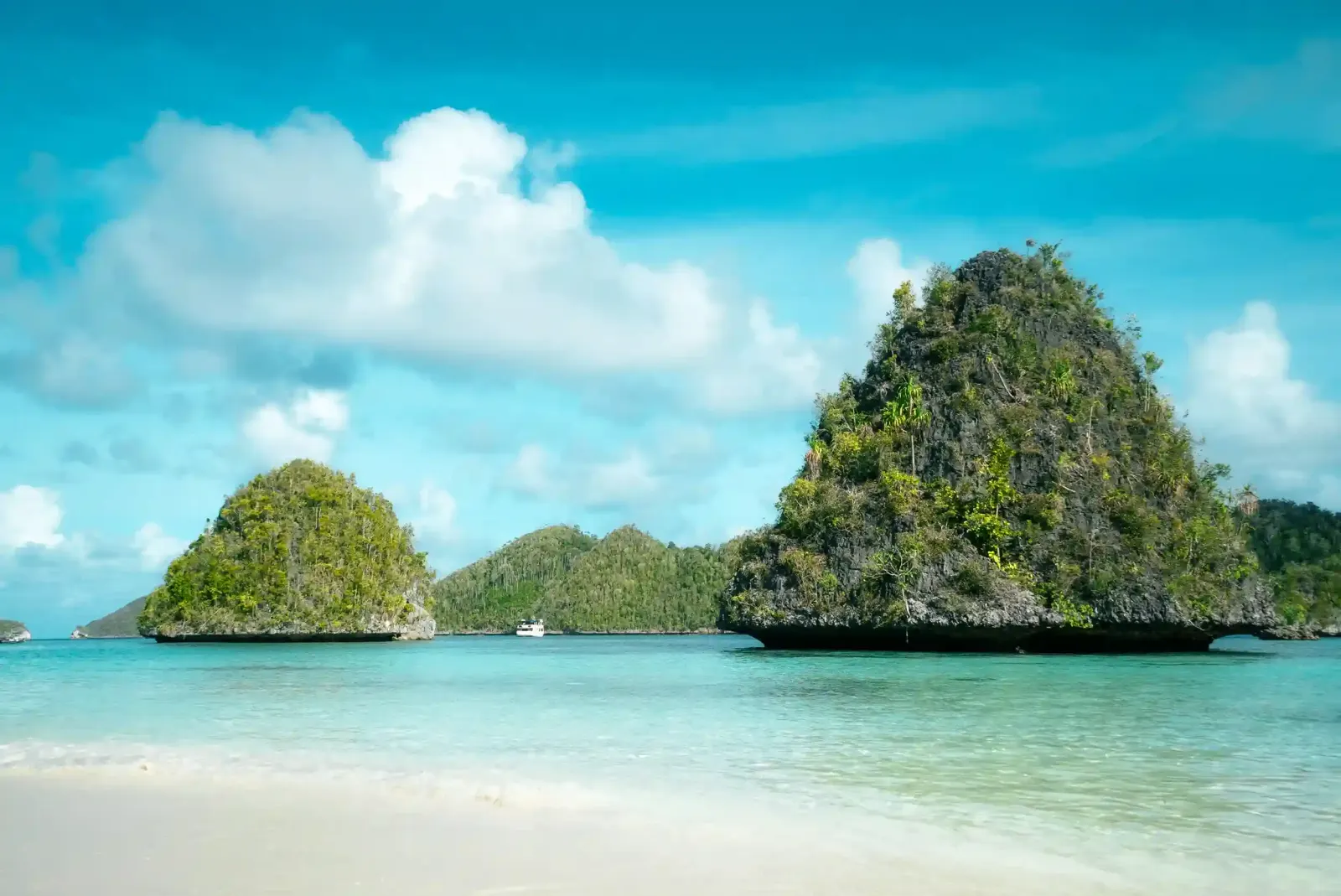Karst islands and a white beach at Wayag, Raja Ampat