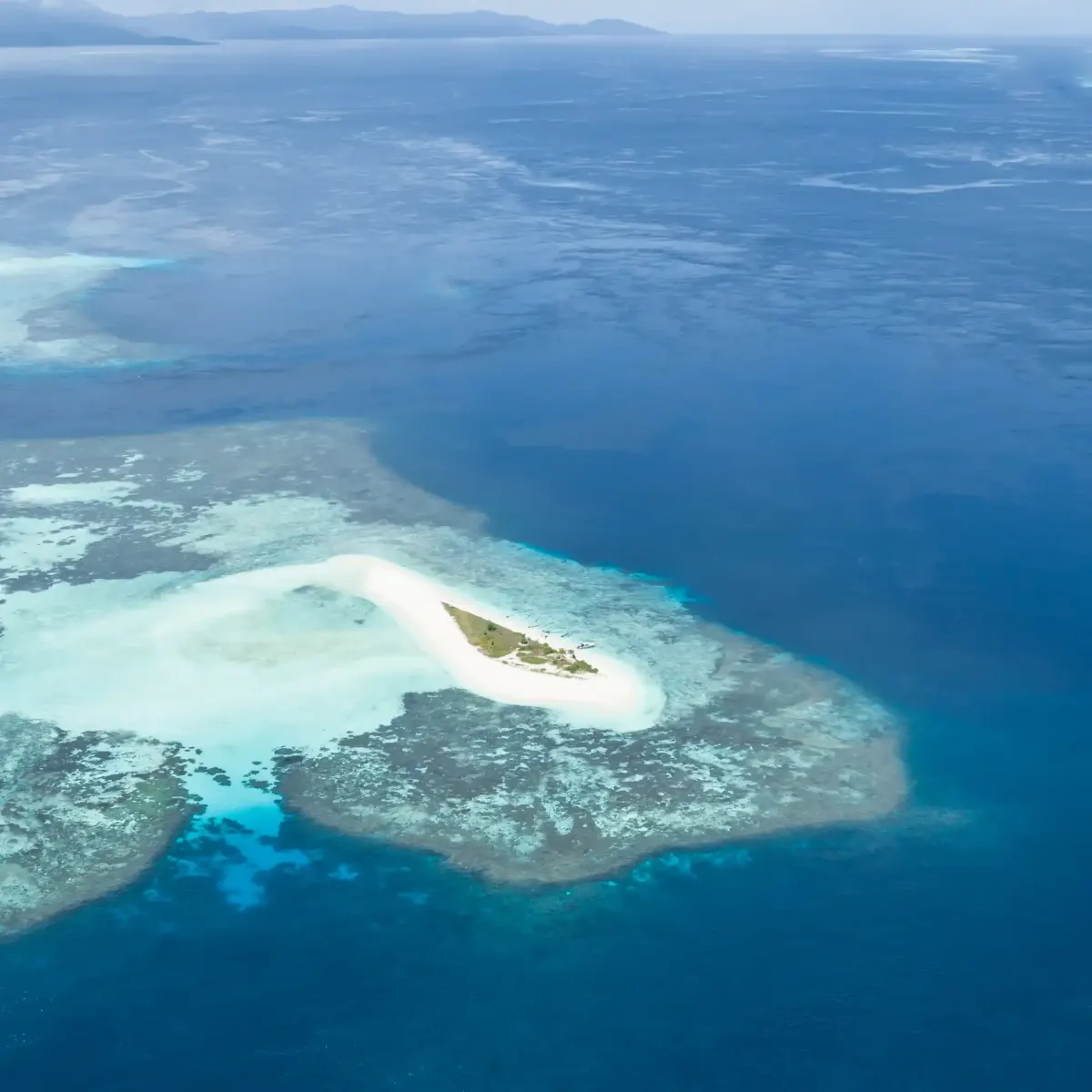 A sandbar in open water